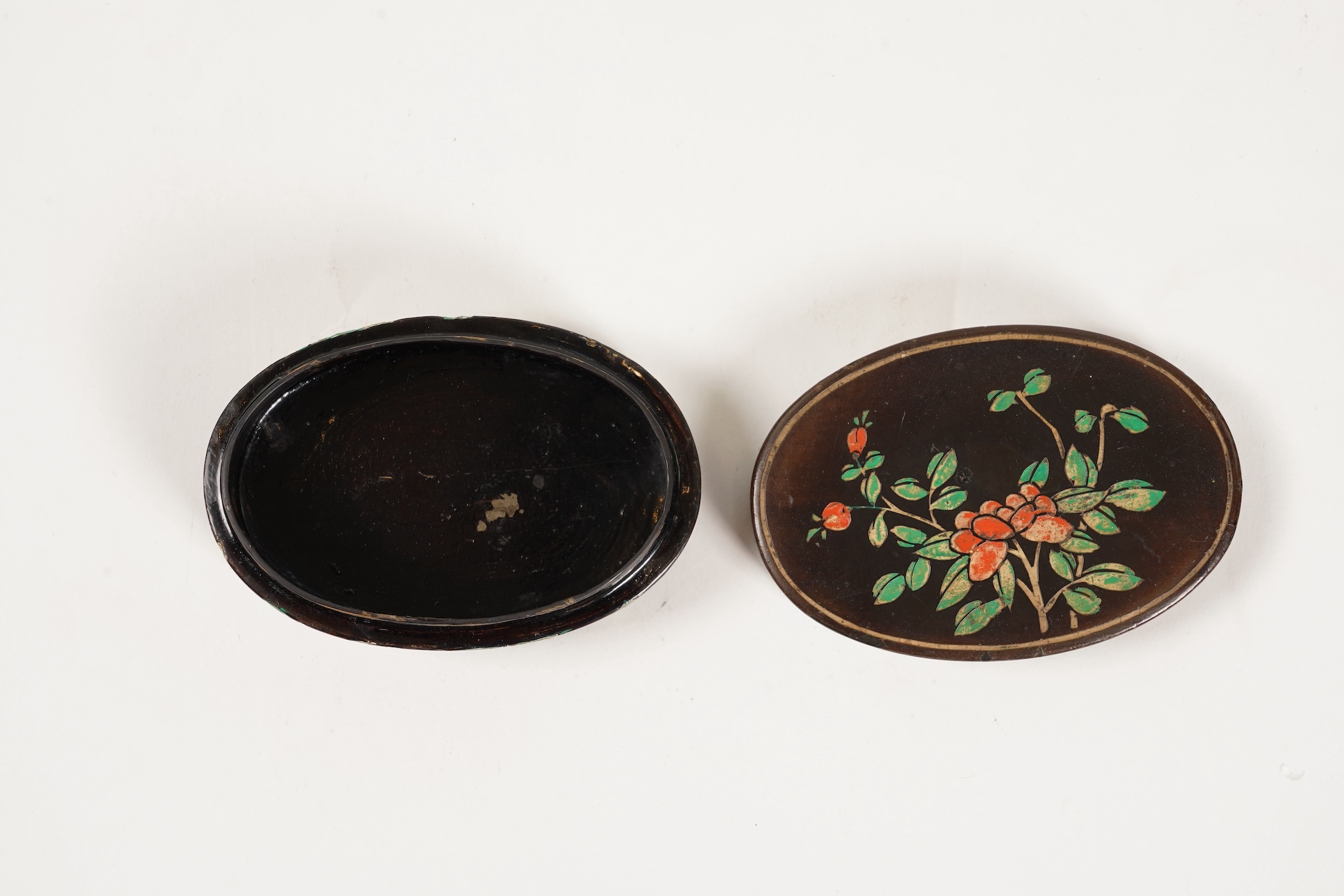 A small Chinese coromandel lacquer oval box, Kangxi period